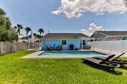 Beach-Side Apartment with a Heated Pool!