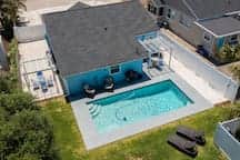 Beach-Side Apartment with a Heated Pool!
